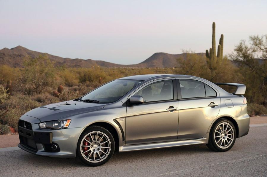  Mitsubishi Lancer Evolution X GSR 2013 года  (фото 1 из 43)